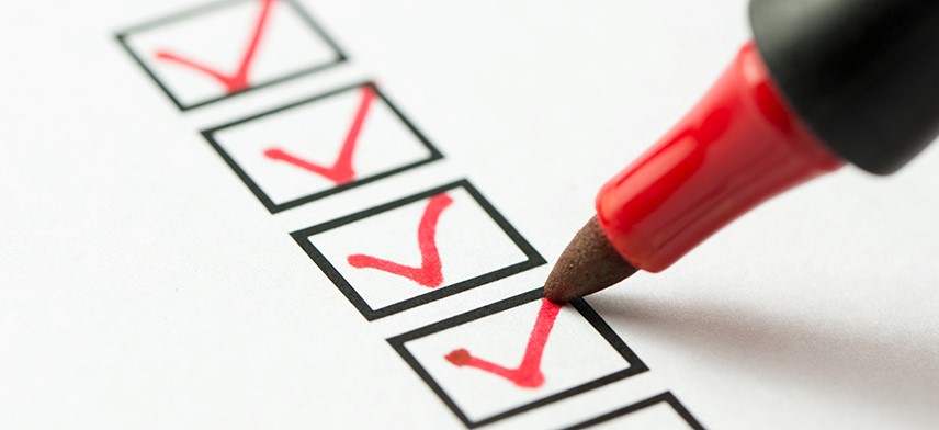 office move checklist boxes being checked with red marker