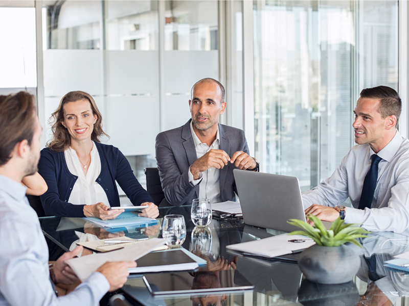 project managers discussing employee relocation