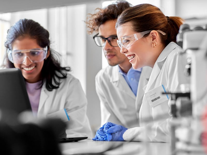 Smiling Young Scientists Research